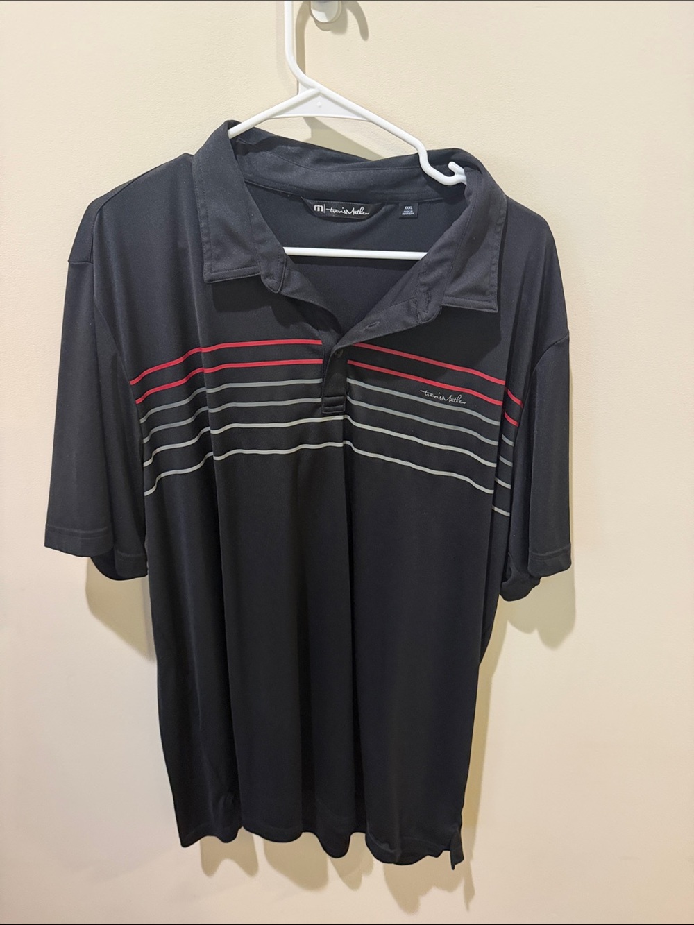 Travis Mathew Black Polo with Red & Gray Chest Stripes